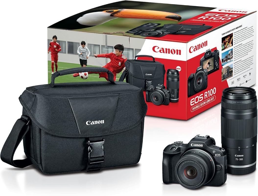 Canon EOS R100 mirrorless camera with black double‑zoom lens kit spann